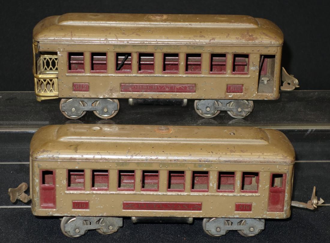 LIONEL PASSENGER CARS (2): Painted tin; (1) 610 Pullman, (1) 612 Observation; wear and paint chips; L-9", F-G