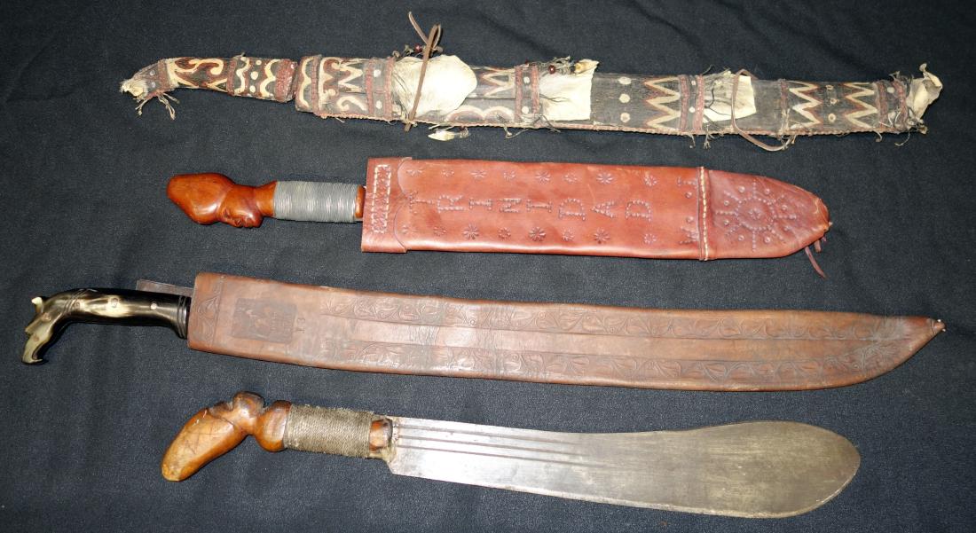 MACHETE TYPE KNIVES (4): (1) horn handle with sheath, "Como Hombres Soy Tu Amigo" MSN with floral motif on one side; other side, "Como Cabrones Tu Padre" with floral motif; (1) blade marked Robert Mole & Sons, Birmingham Engl