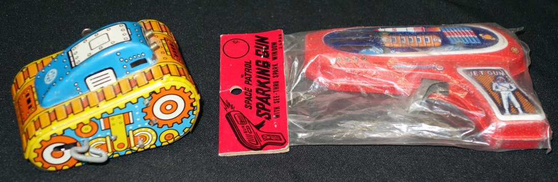 SPACE GUN & TANK: (1) Marx toy tank - Litho tin; mechanical; works; needs flint; (1) Jet Gun - sparking, Japan; original package; L-4", VG