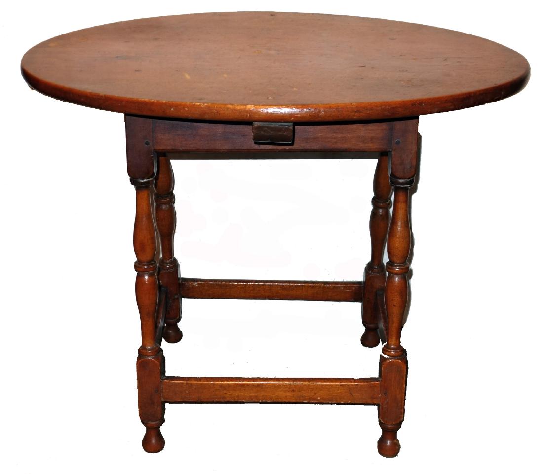 NEW ENGLAND TEA TABLE: Pine; oval top; block & turned legs with stretcher base; normal wear; G-27", L-33"; G