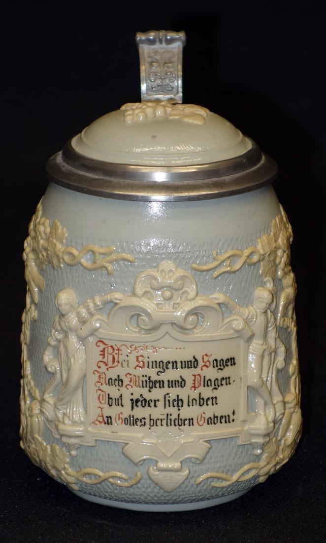 METTLACH STEIN (1/2 L): Relief shield with verse and figures, grapes, vines, birds; #1370; H-6"; EX-VG