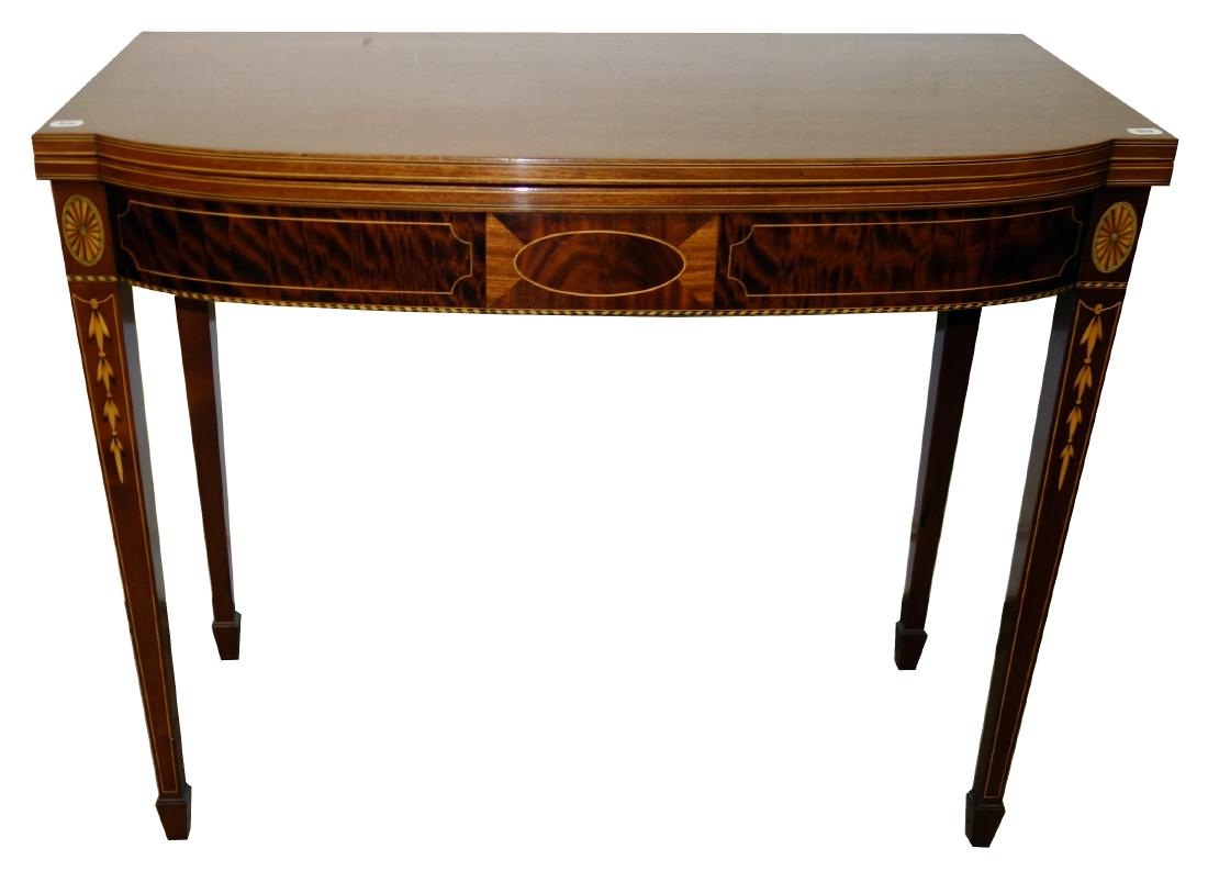 POTTHAST GAMES TABLE: Mahogany; Hepplewhite style; oval fan, bellflower, band and line inlay; spade foot; H-30", W-36", Depth 18 1/8", VG-EX