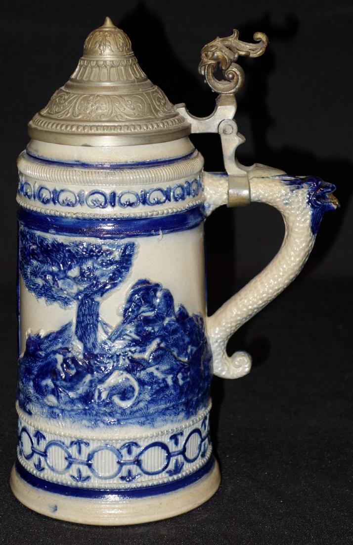 BLUE AND GRAY STONEWARE STEIN: White's; #46; 1L; relief hunting scenen with verse; pewter lid with Phoenix thumb lift; H- 10", EX-VG