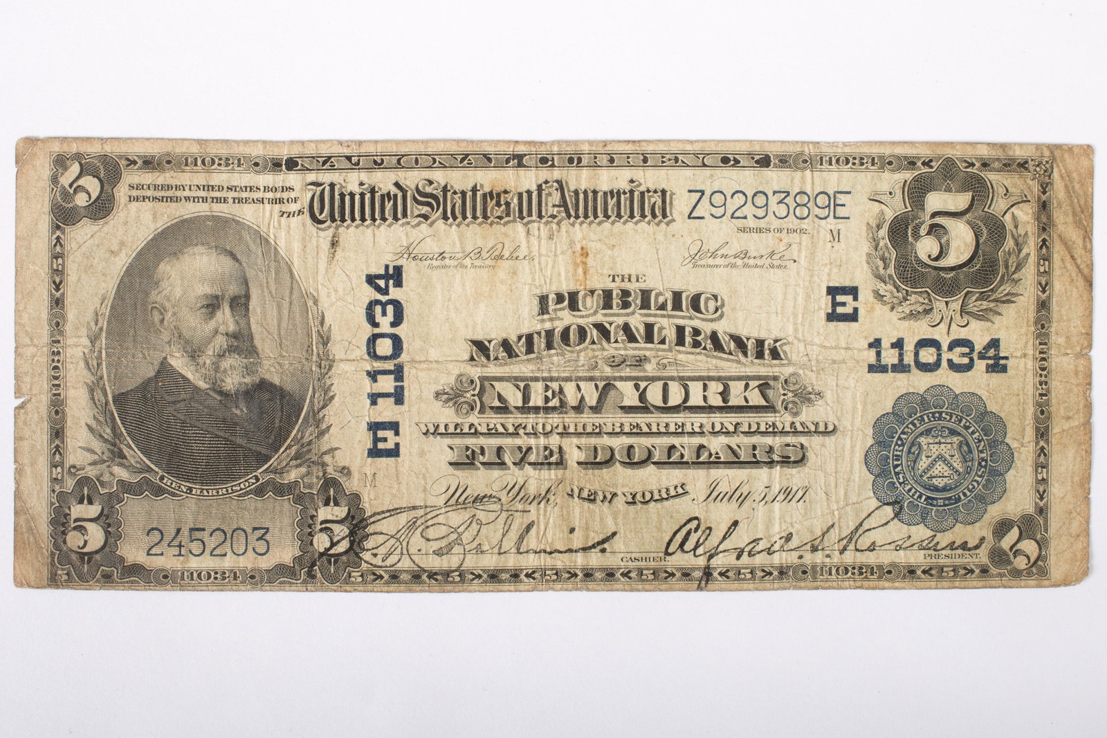 1902 $5 NATIONAL CURRENCY NEW YORK NY: New York, New York; E11034 - Z929389E - 245203-M; vertical and horizontal folds; pin hole in center; small edge tears; significant creases; soiled; VG