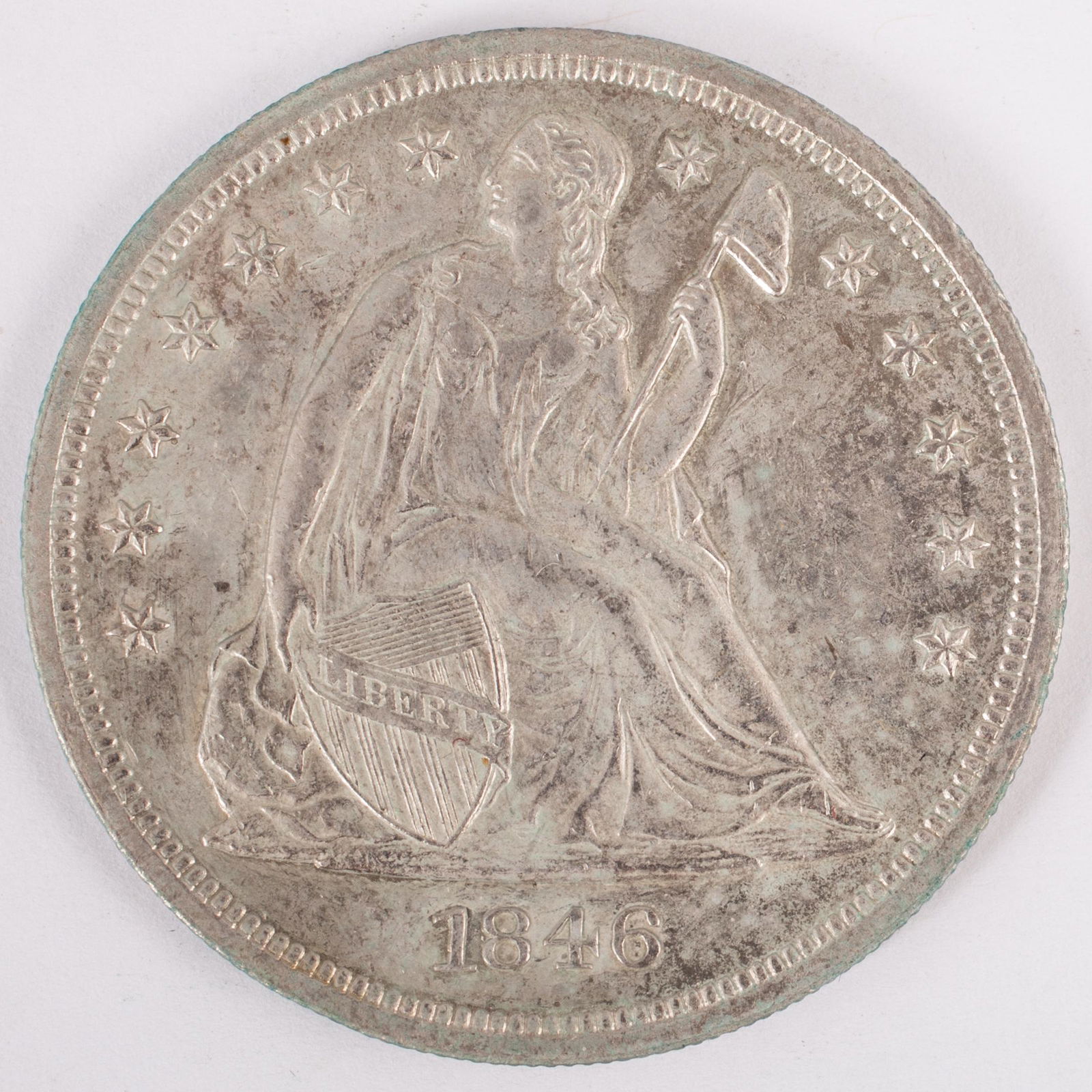 1846 SEATED DOLLAR (1 of 2)
