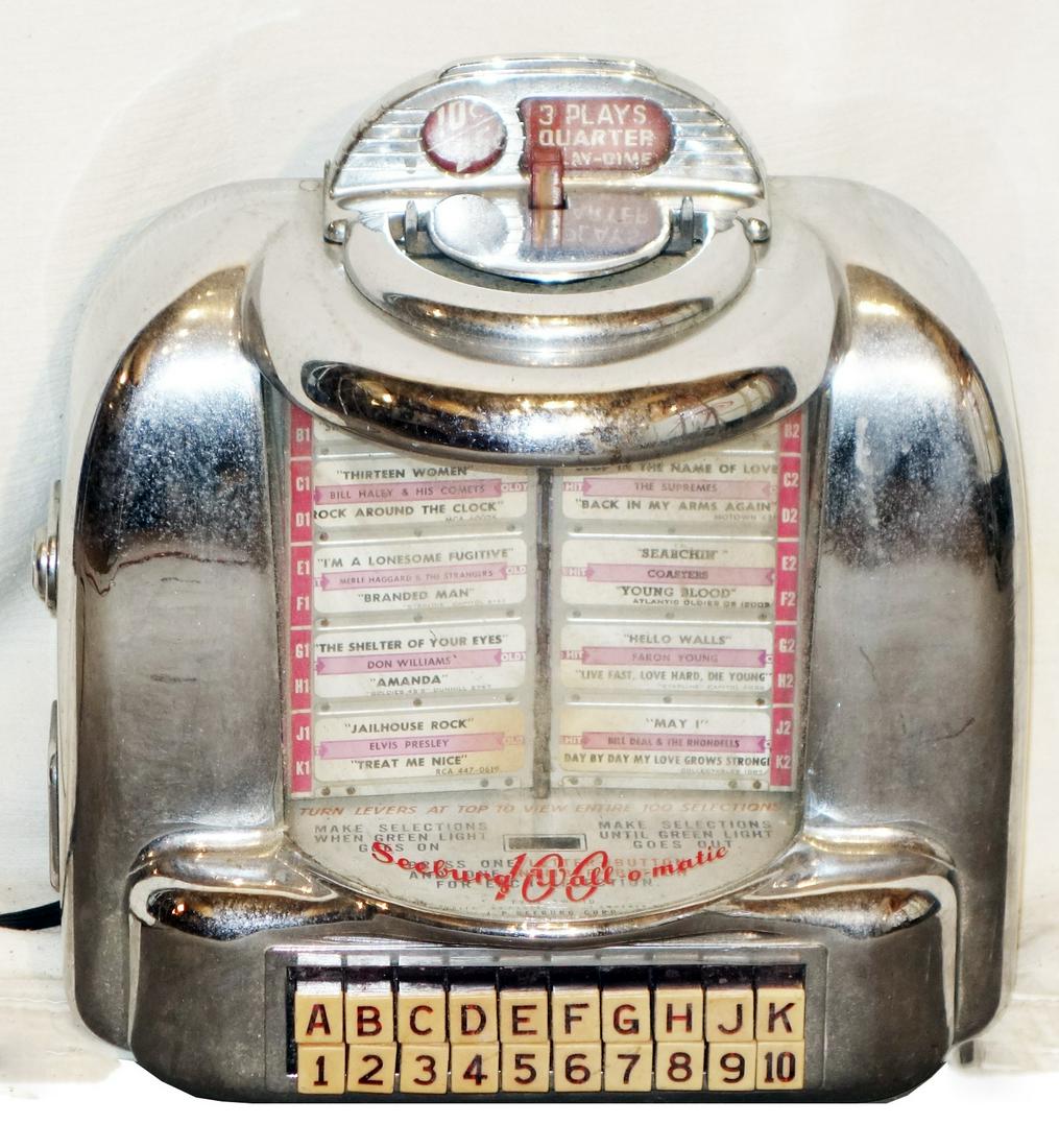 SEEBURG "WALL-O-MATIC" MUSIC PLAYER: 10-cent, 25-cent; untested; normal wear, some chrome pitting; 13"x11"