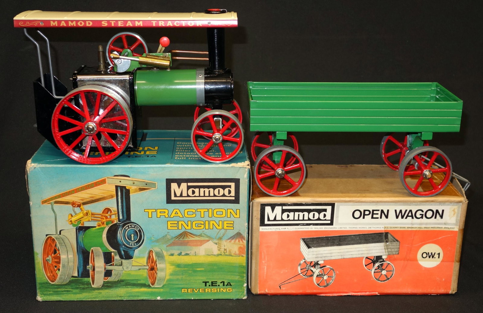 MAMOD STEAM TRACTOR & WAGON: Painted metal; original boxes; (1) traction engine - T. E. 1A; (1) open wagon - OW 1; boxes L-10 1/2", EX-NM