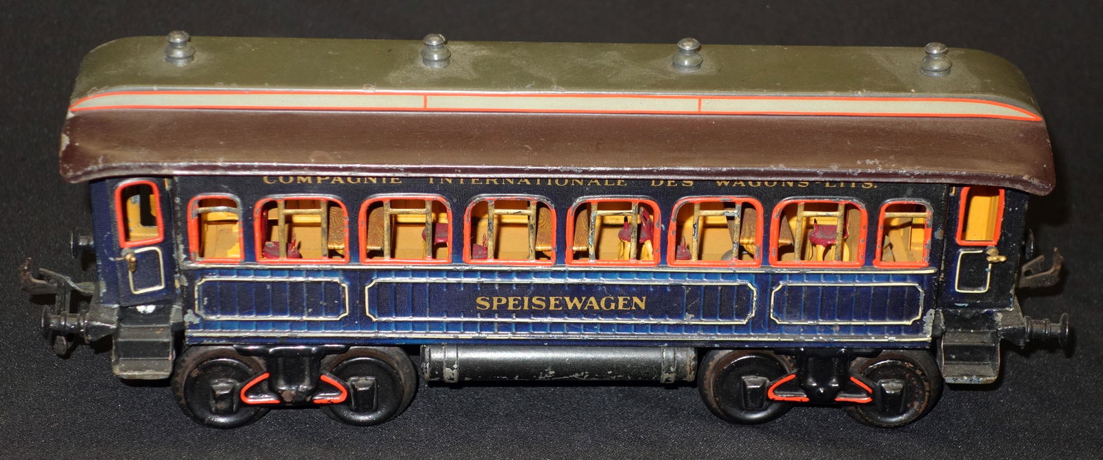 MARKLIN DINING CAR: "Speisewagen", "Compagnie International"; One gauge; painted tin; normal wear; some touch-up on (1) doorway on one end; L-14", G-VG