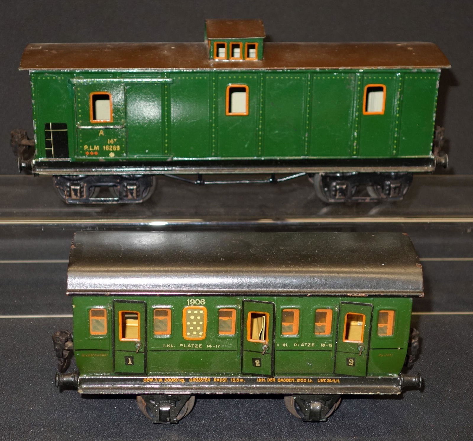 MARKLIN ONE GAUGE CARS (2): Painted tin; (1) PLM baggage car #16289; (1) Platze passenger car #1906; L-9"-12", G-VG