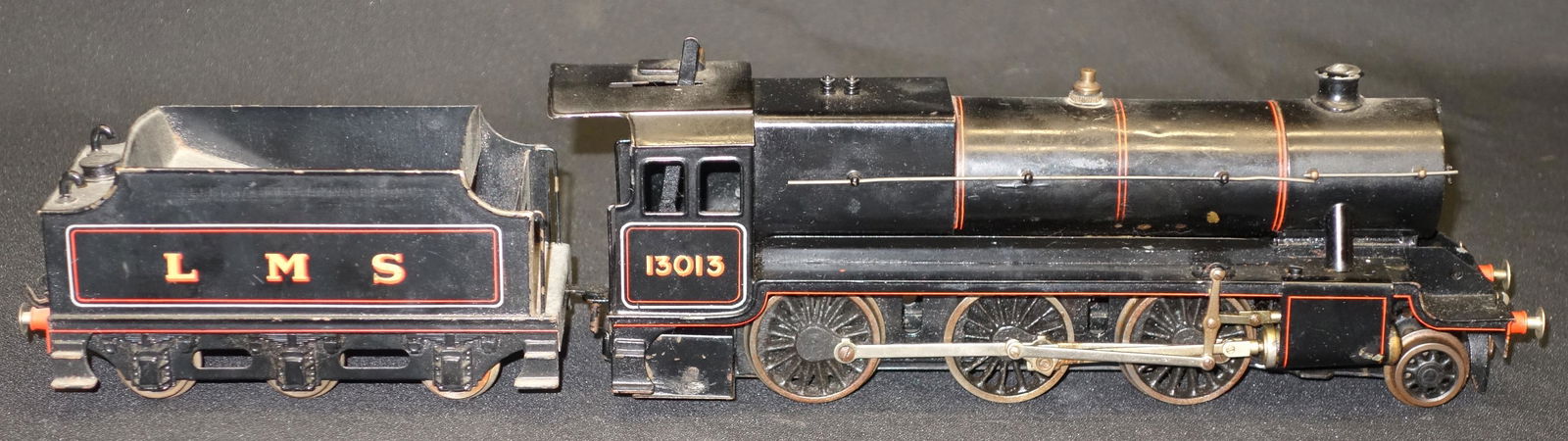 BASSETT LOWKE STEAM TRAIN: Live steam; engine and tender "13013 LMS"; painted tin; some flaking; L-17 1/2", VG-EX
