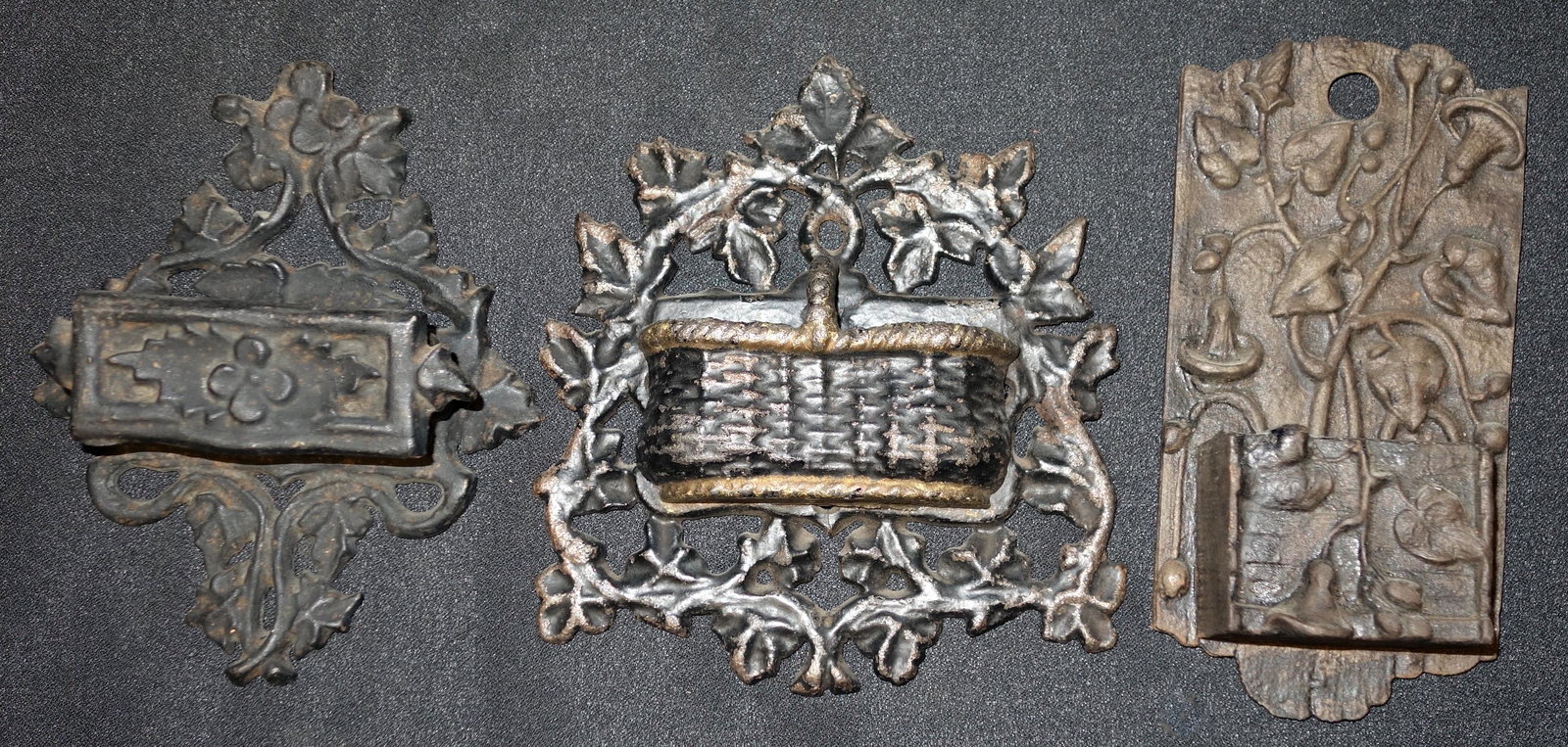 VICTORIAN MATCH WALL POCKETS: Floral form; painted cast iron; some overpaint; H-6"-7", F-G