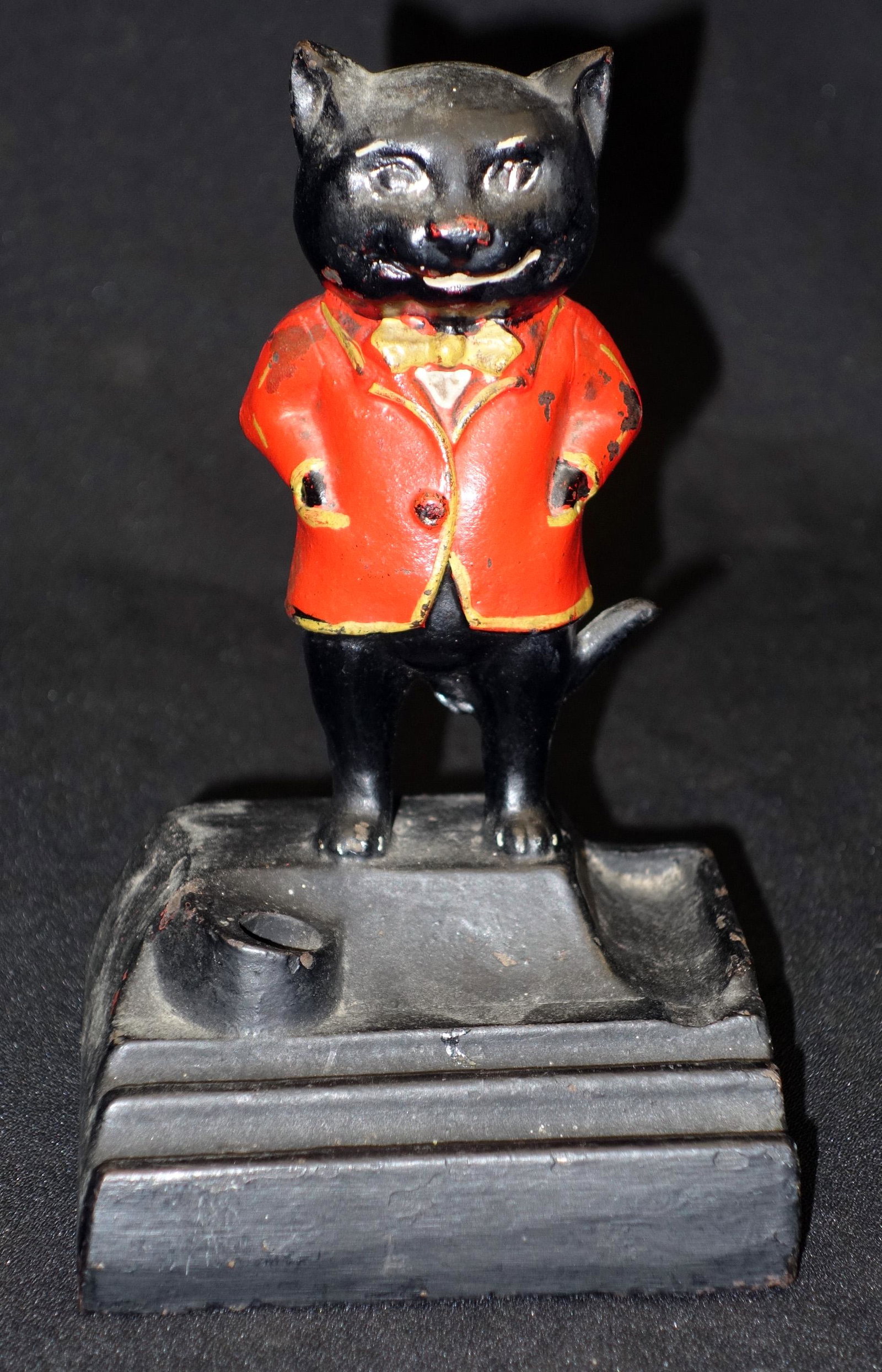 FIGURAL CAT PEN HOLDER: Painted cast iron; same figure used for "Katz" drug store; paint appears original; wear; H-7", G-VG