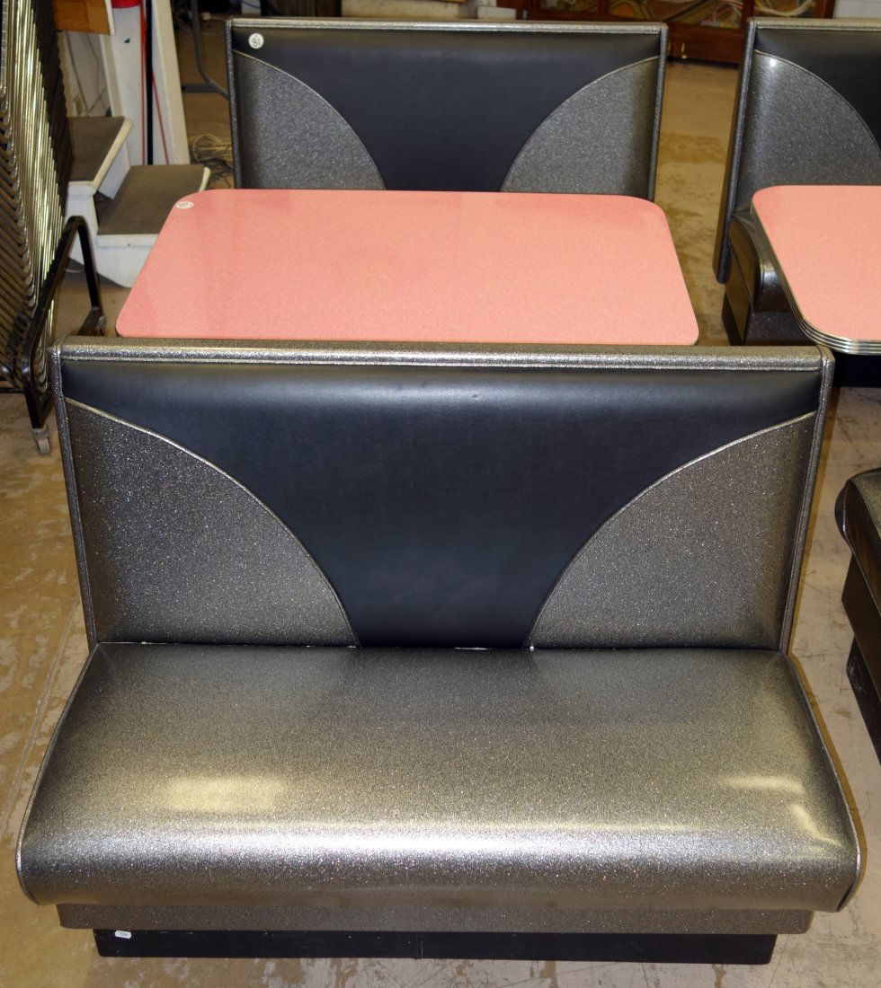 PAIR OF SODA FOUNTAIN BENCHES & TABLE: Contemporary; black and silver metallic vinyl benches; pink retro pattern formica top table with chrome banding; pedestal base; very minor wear; table 43 1/2" x 29 3/4"; 29" high; benches 27 1/2" x 23