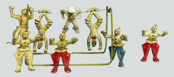 8 GREY IRON CLOWNS AND STAND - SAILOR SAM