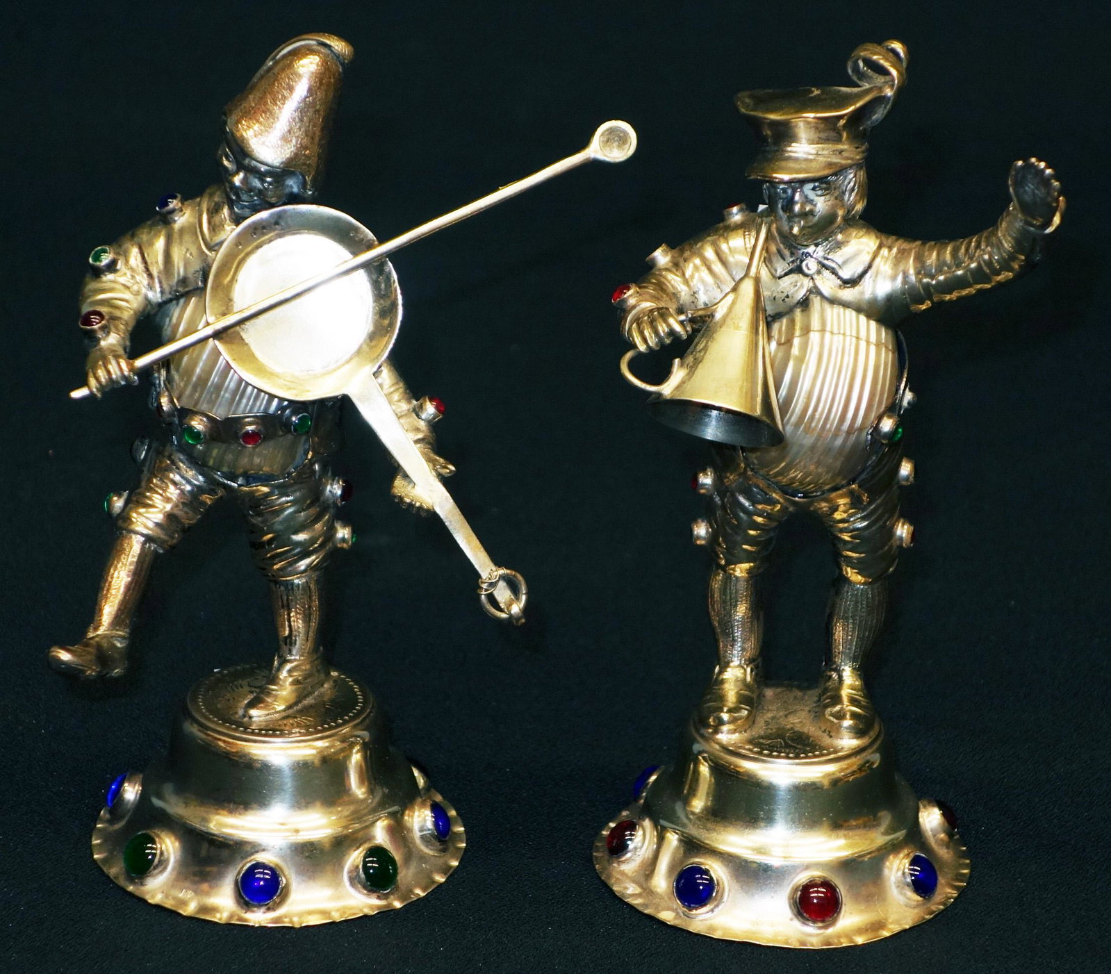 SILVER MUSICIAN FIGURES - M.S. GOLDSCHMIDT: Comic silver figures with shell bodies, cabochon stones; 800 silver; (1) playing funnel, (1) playing frying pan; (1) stone missing; H-6", VG-EX
