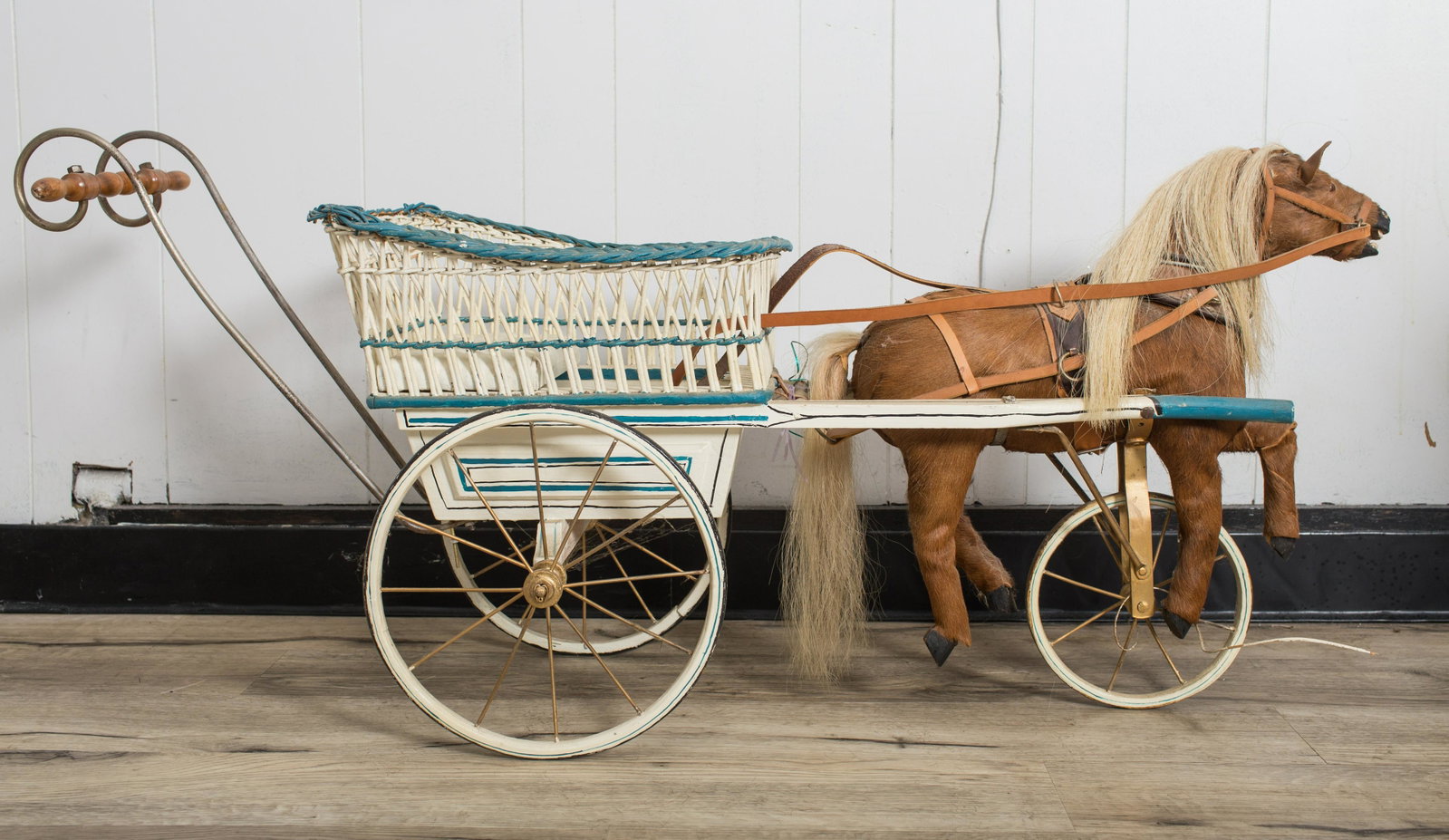 CHILD'S "CABRIOLET" DOLL CARRIAGE: Hide covered horse, wicker and painted wood stroller; repainted; H-22", L-48", G-VG