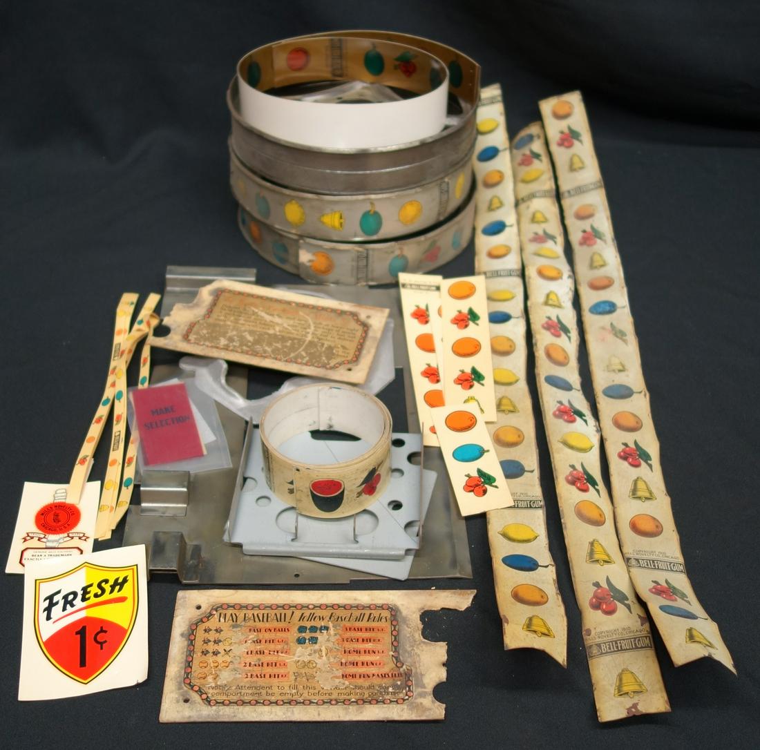 SLOT MACHINE PARTS: Reels, paper strips, tin strips, decals, etc.; some old and some reproduction; P-EX