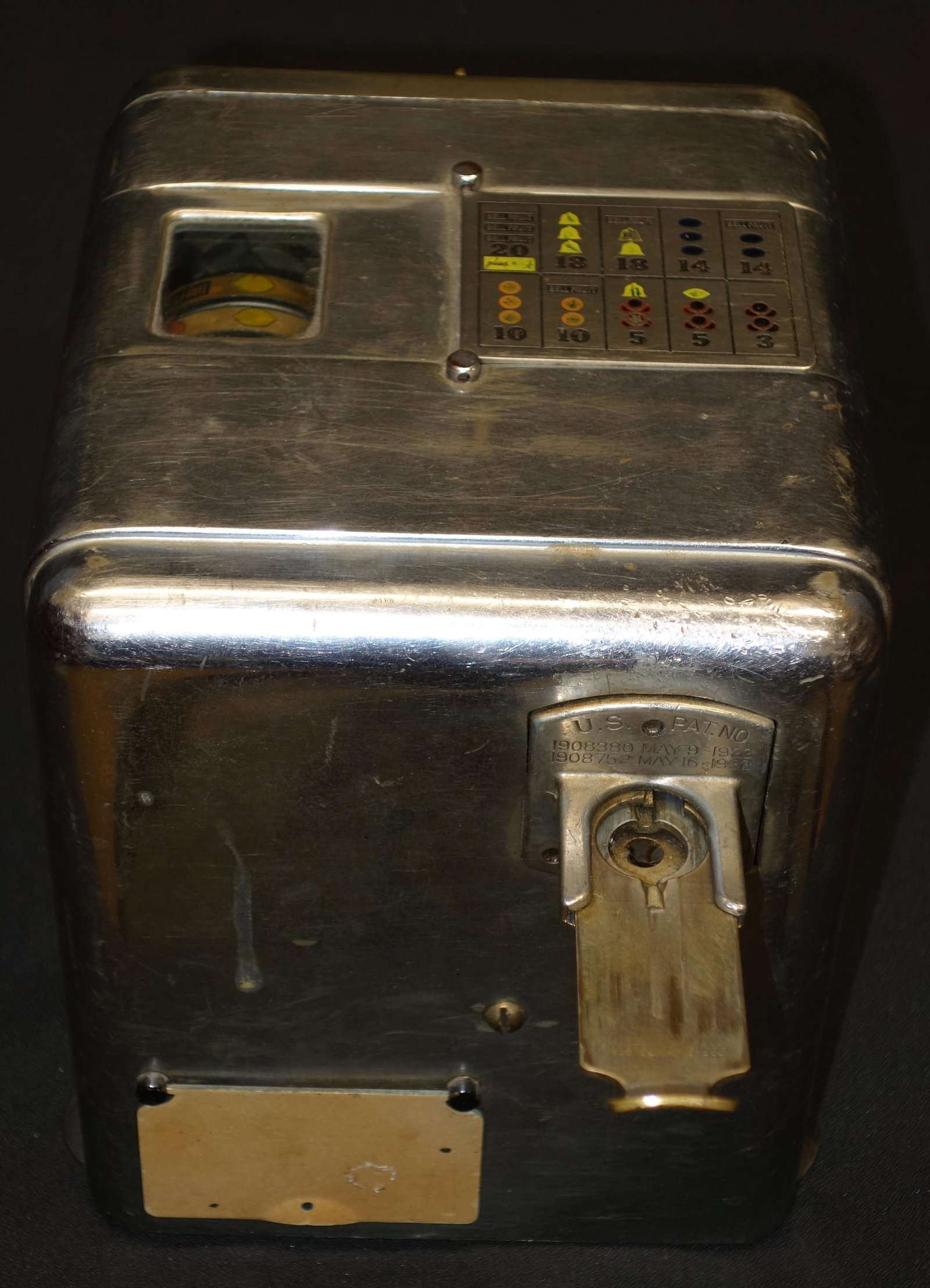 VEST POCKET VENDOR: 5 cents; counter top; nickel plated; three wheel with paper litho; works; retains key; normal wear; scratches and rubs; H-8", G