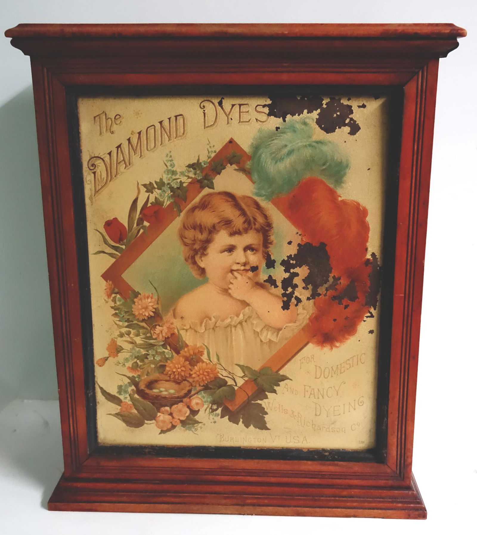 DIAMOND DYE CABINET: Litho tin front in wooden cabinet; sliding back doors; partial inserts; flaking; wood case worn; H-20", F-G