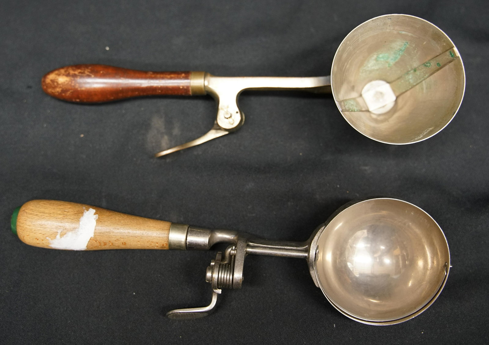 ICE CREAM SCOOPS (2): Nickel plated with wood handles; (1) Gilchrist conical #33; (1) Benedict Indestructo #4 - (6); normal wear; L-10 1/2", G-VG