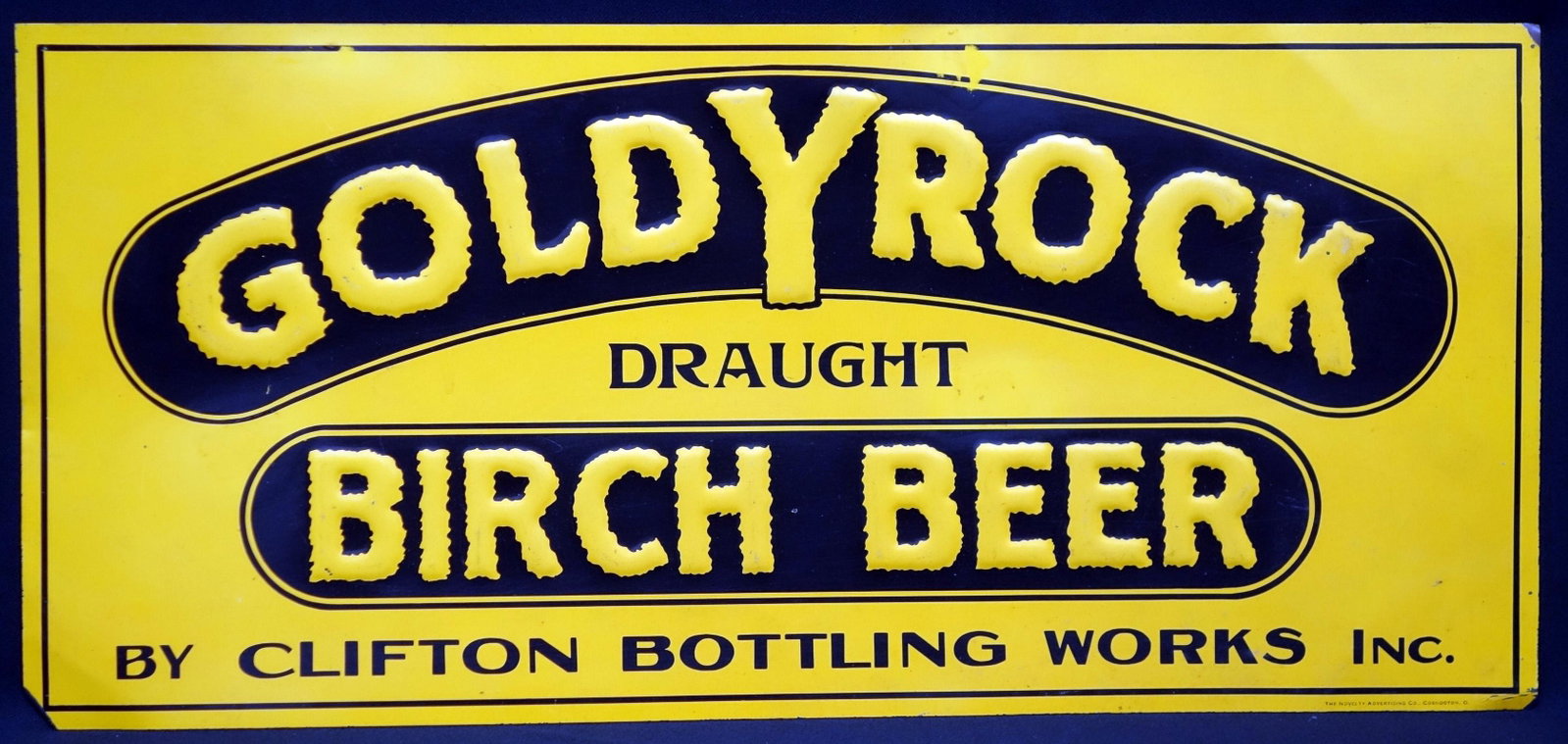 "GOLDYROCK" BIRCH BEER SIGN: Tin litho, embossed; normal wear; 20" x 9", G-VG