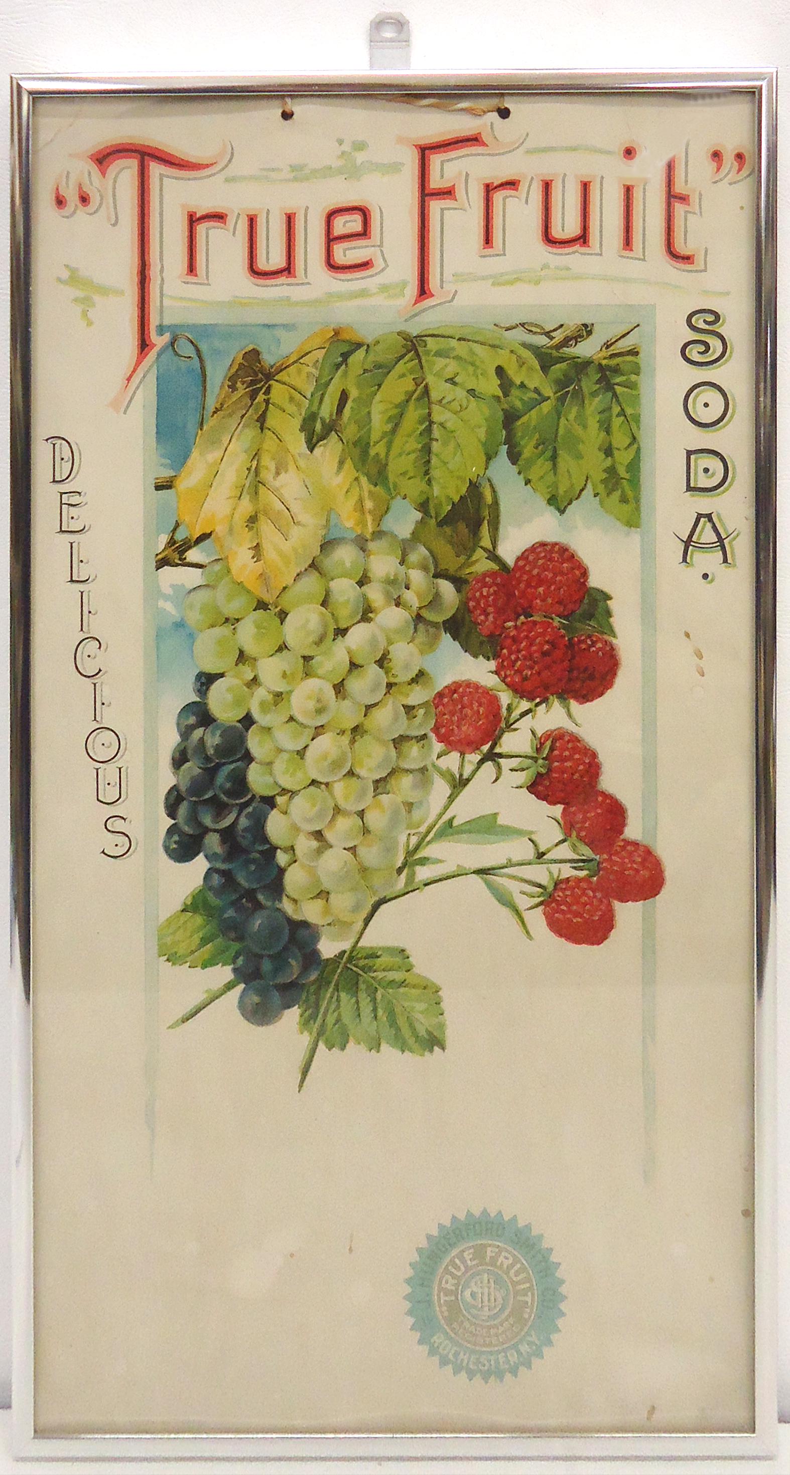 SODA FOUNTAIN ADVERTISING SIGN: "True Fruit" "Delicious Soda" litho cardboard string hanger; framed size-16"x9"; some soiling/staining and creases; F-G
