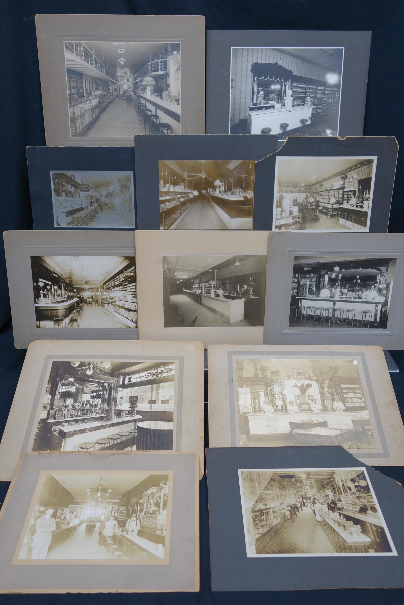 VINTAGE SODA FOUNTAIN /STORE PHOTOS (12): All have fountains; most have people; normal wear and fading; some boards chipped; largest 8"x 10", G-VG