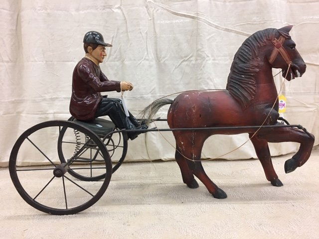 SULKEY MODEL: Carved and painted wood figures in metal sulkey; damage and loss to driver's hat; normal wear; H-26", L-44", G-G+