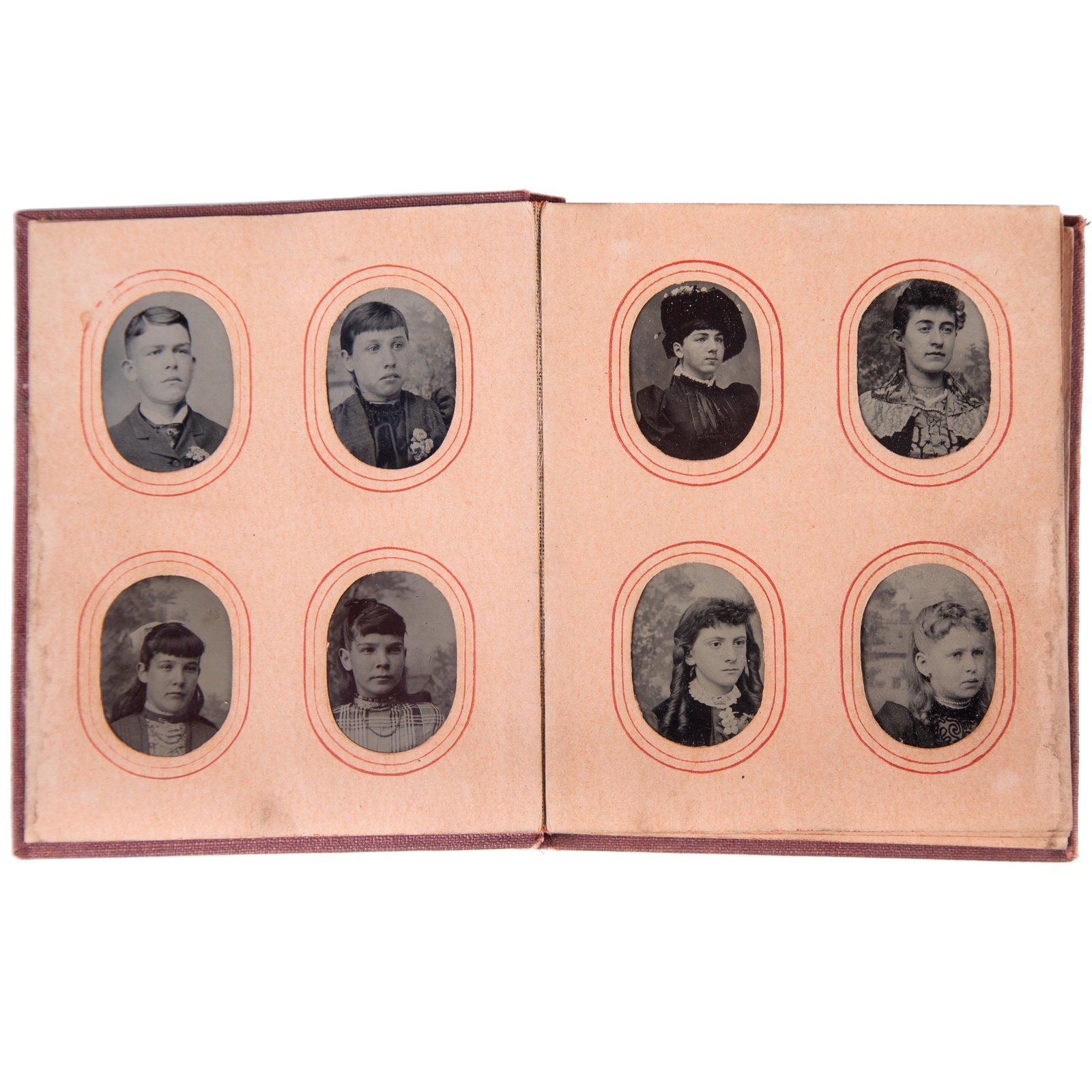 TINTYPE PHOTO ALBUM "GEM ALBUM": Mostly miniature tintypes of children and young people; (39) tintypes; cloth binding; image 1 1/2" x 1", G-VG