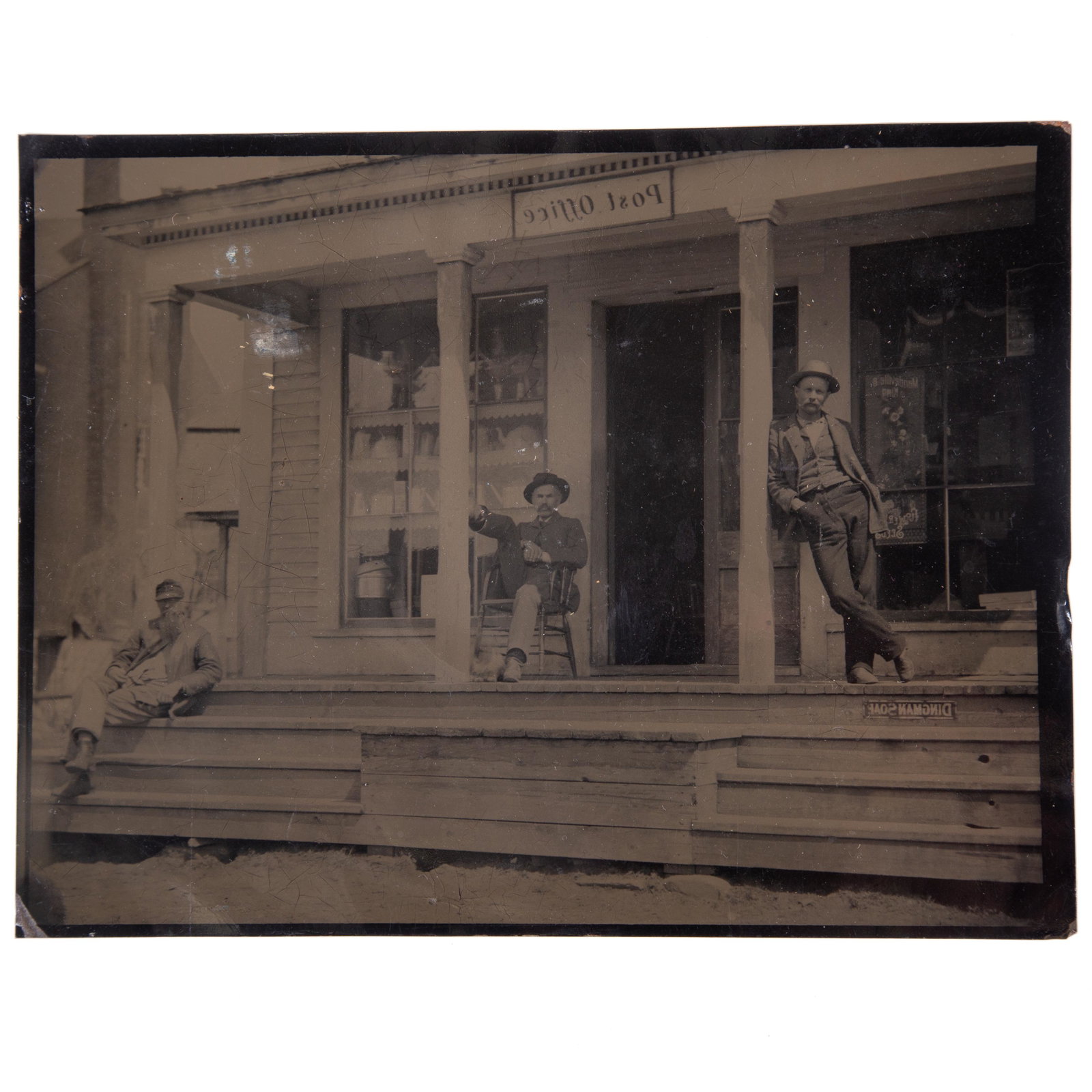 TINTYPE "POST OFFICE": Full plate; clear image of three men on porch of store with "Post office" sign; no case; no mat; somewhat dark; G-VG