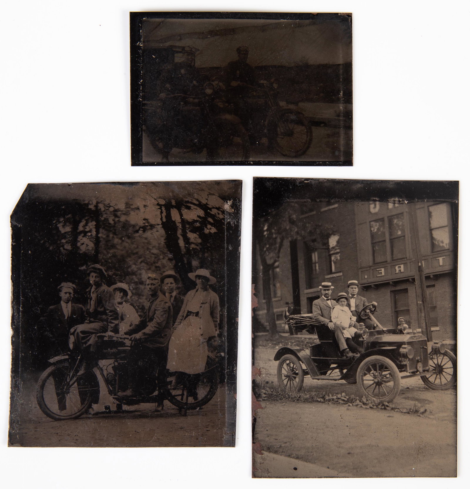 MOTOR VEHICLE TINTYPES (3): Sixteenth and 9th plate; (1) image of two police on motorcycles; (1) image men in open car witih child; (1) sportsman on motorcycle with ladies on handlebars and fender, three men behind; no mat; no c