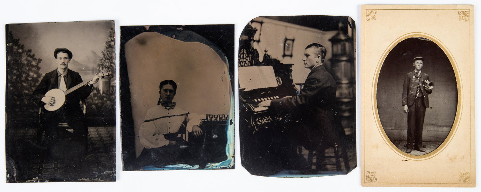 MUSICAL TINTYPES (4): 6th plates; (1) horn player in uniform; (1) banjo; (1) organ; 1-with paper mat; no cases; some dark; G-VG