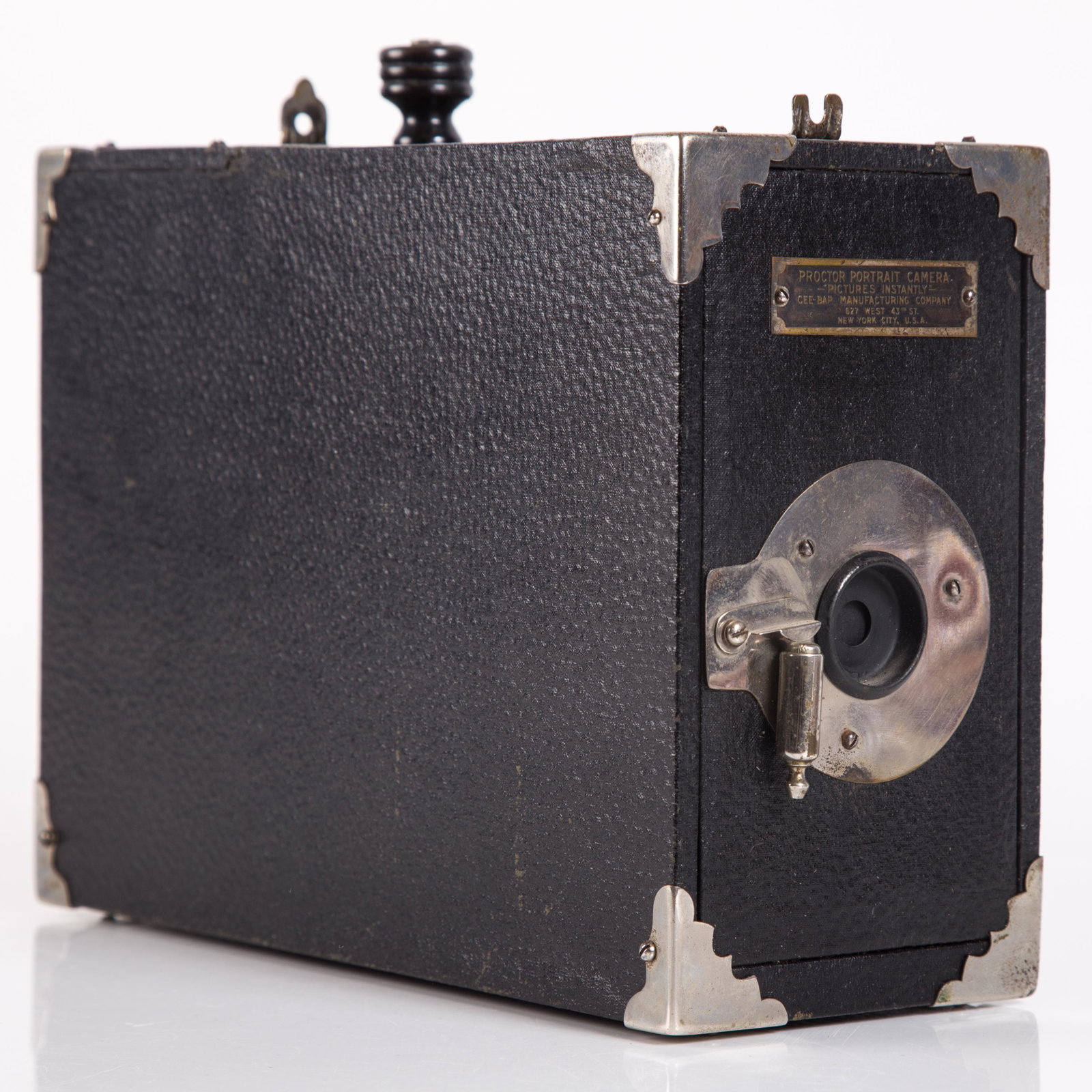 PROCTOR PORTRAIT CAMERA: Cee Bar Manu. Co.; "Pictures Instantly"; covered wood case with plunger; metal corners; normal wear; missing lower tank; some rust on tank rim; L-10", G-G+