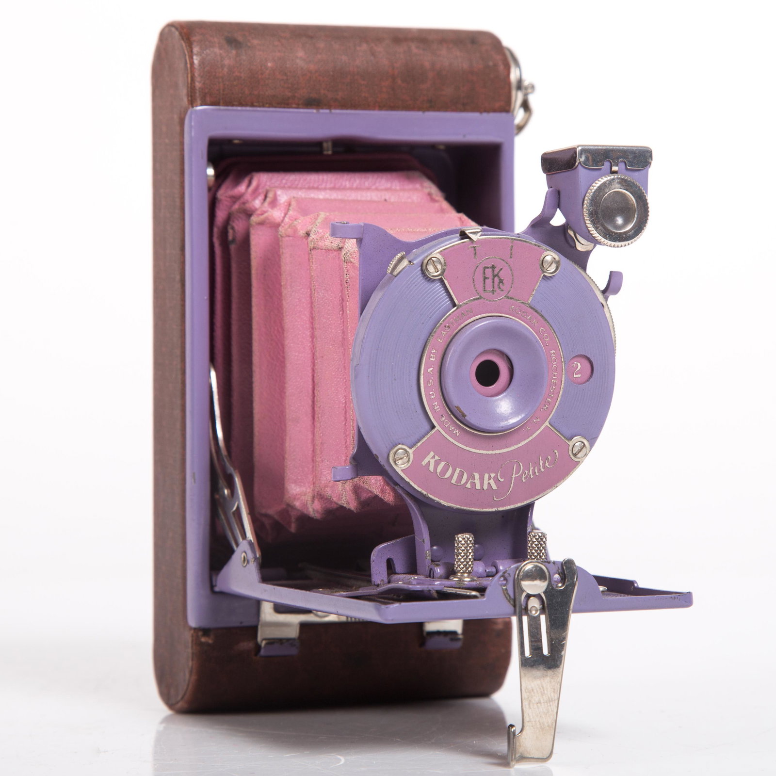 RARE AUTOGRAPHIC KODAK PETITE CAMERA: Folding; pink and purple front; bellows wear; normal wear; L-5", G-VG