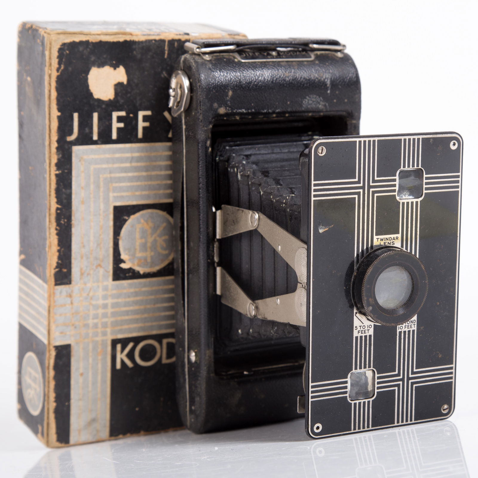 KODAK "JIFFY" CAMERA: S16-16 Twindar lens; pop-up; strap intact; bellows edges re-inforced; together with original box; box worn; camera has some wear; L-7 1/2", G-G+