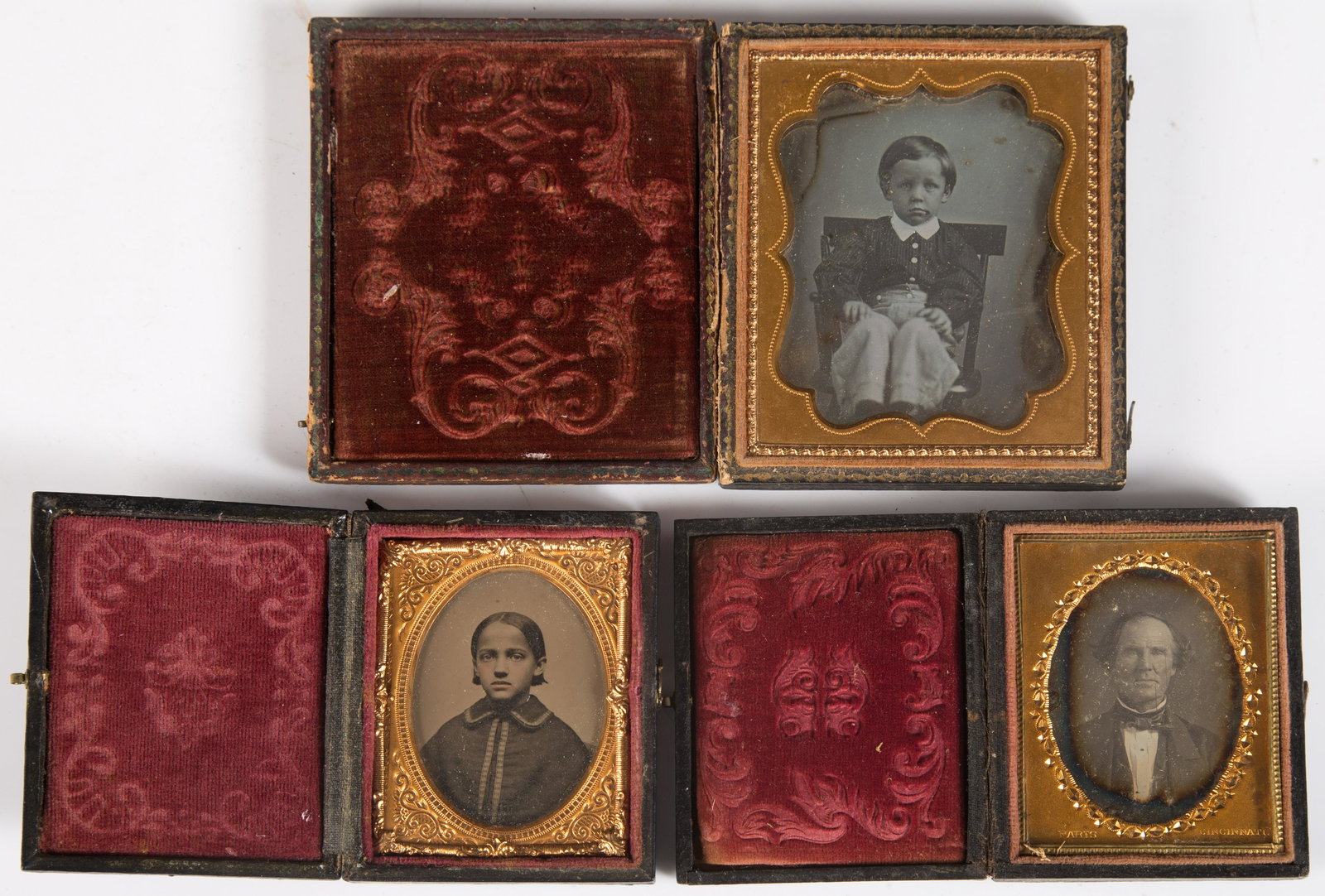 DAGUERREOTYPE & AMBROTYPE PORTRAIT IMAGES (3): 6th - 9th plates; (1) daguerreotype of boy in chair; (1) daguerreotype of elder gentleman; (1) ambro of young girl, highlighted; cases worn; largest case: 3 3/4" x 3", G-VG