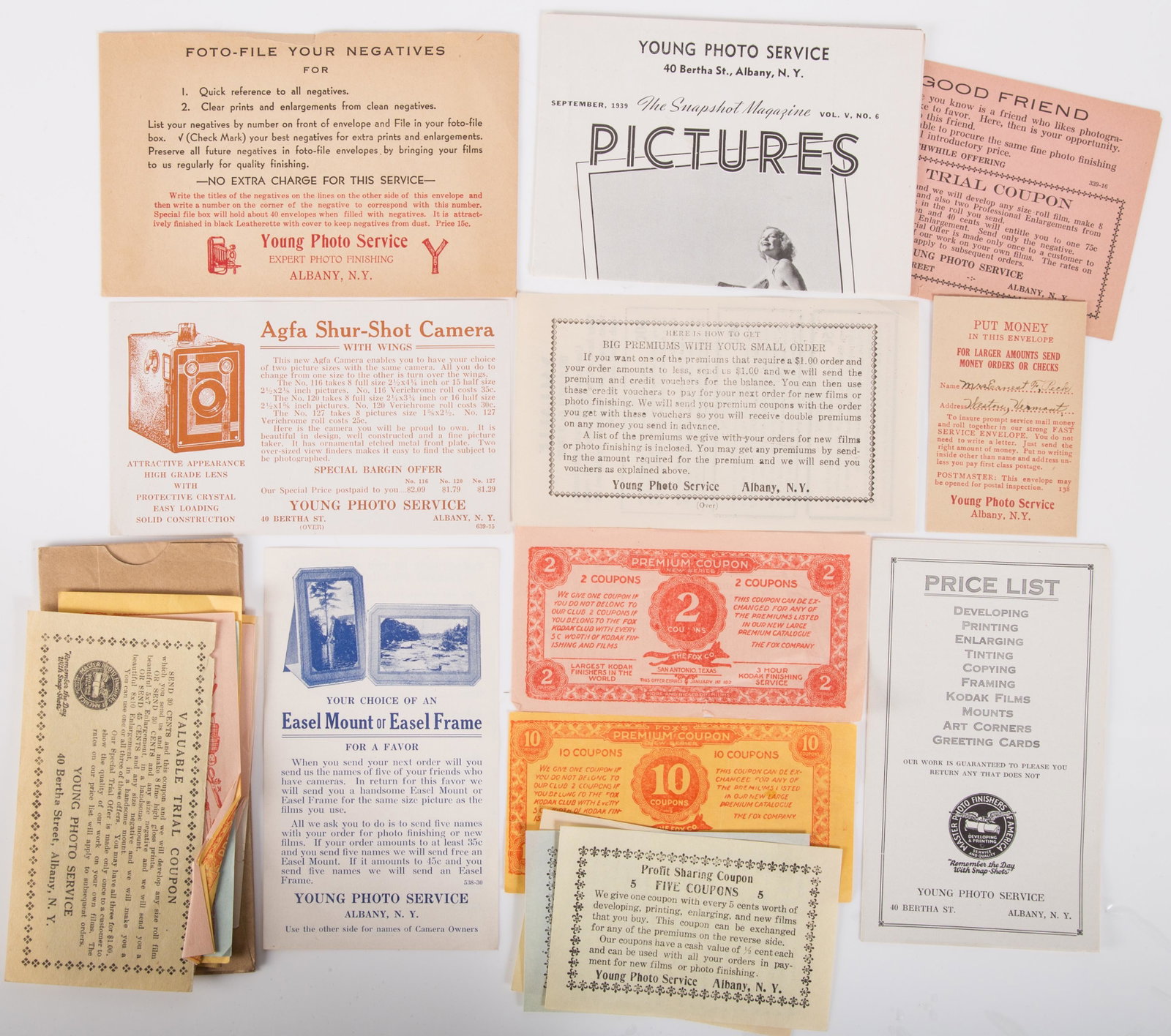 PHOTOGRAPHIC EPHEMERA: Foxes Premium Coupons (11) Fox coupons, (6) Young Coupons, (3) Fox Chex; (6) Young Broadsides and Payment envelope; normal wear; L-6", G-VG