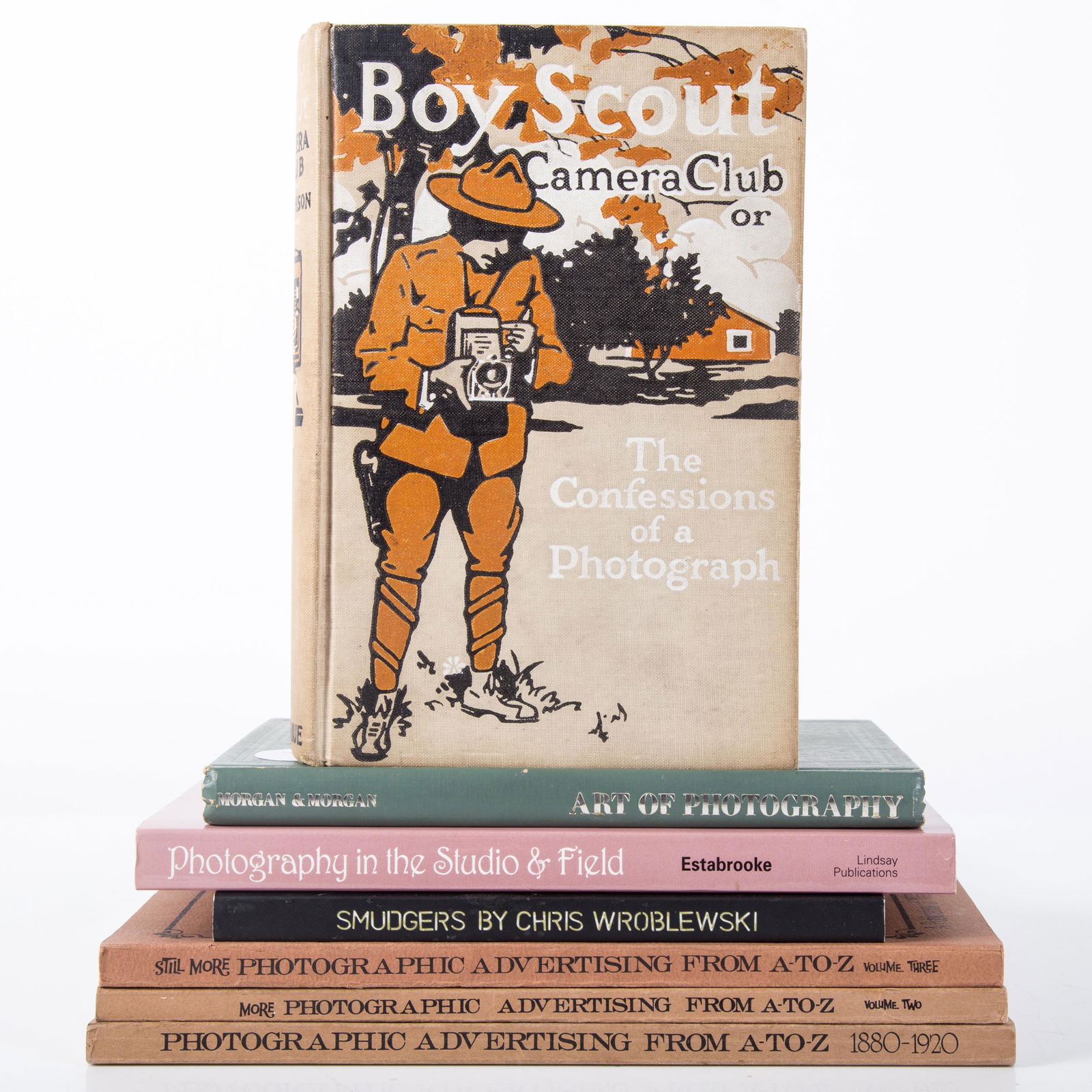 PHOTOGRAPHY BOOKS (7): Photographic Advertising A-Z (3) volume set; Boy Scout Camera Club, etc.; normal wear; largest 9" x 7", G-EX
