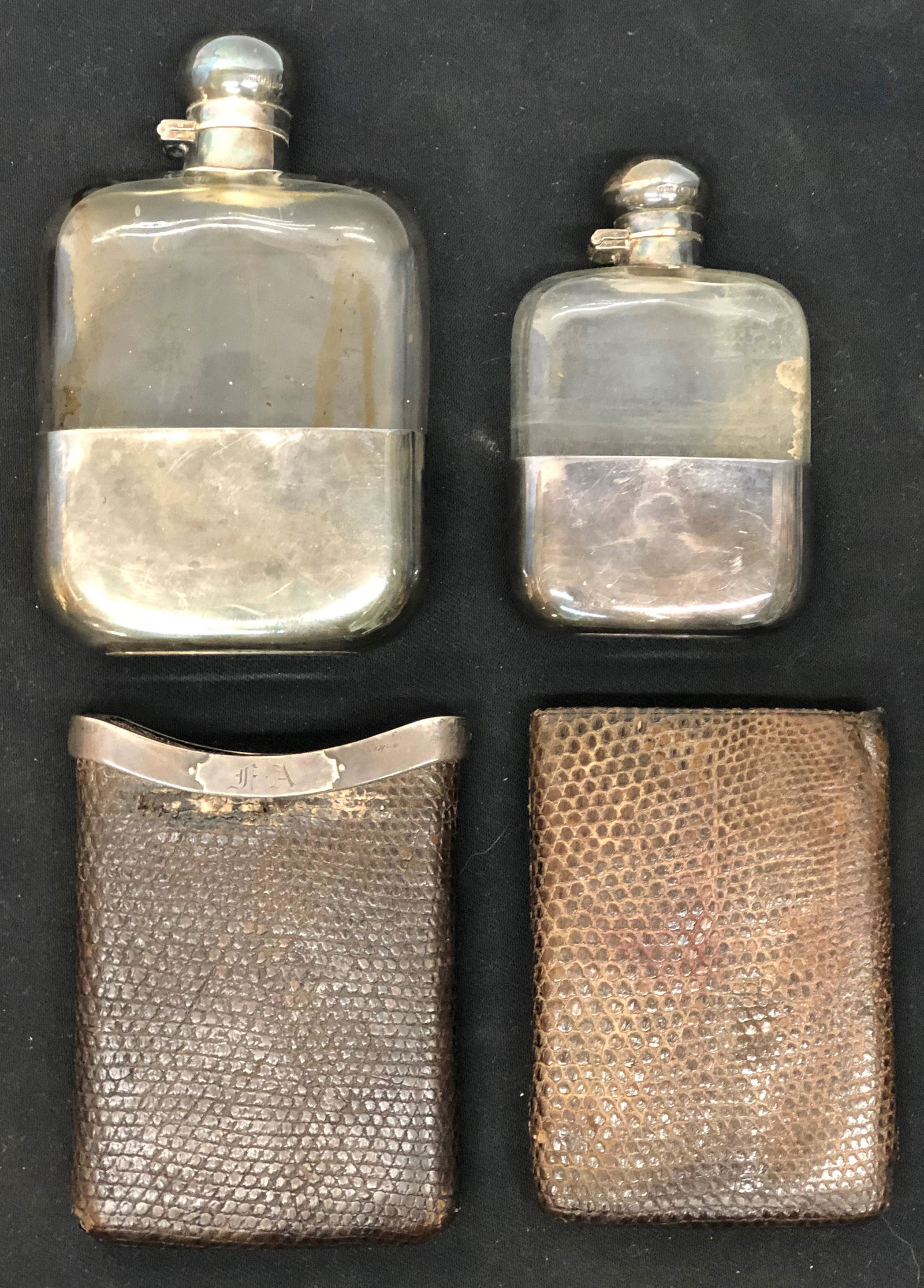 FLASKS & CIGAR HOLDER (3) PIECES: (1) leather cigar holder awith silver trim, wear; (2) Hermes flasks with silver trim; "J.D. & S"; H-5"-6 1/2", F-VG