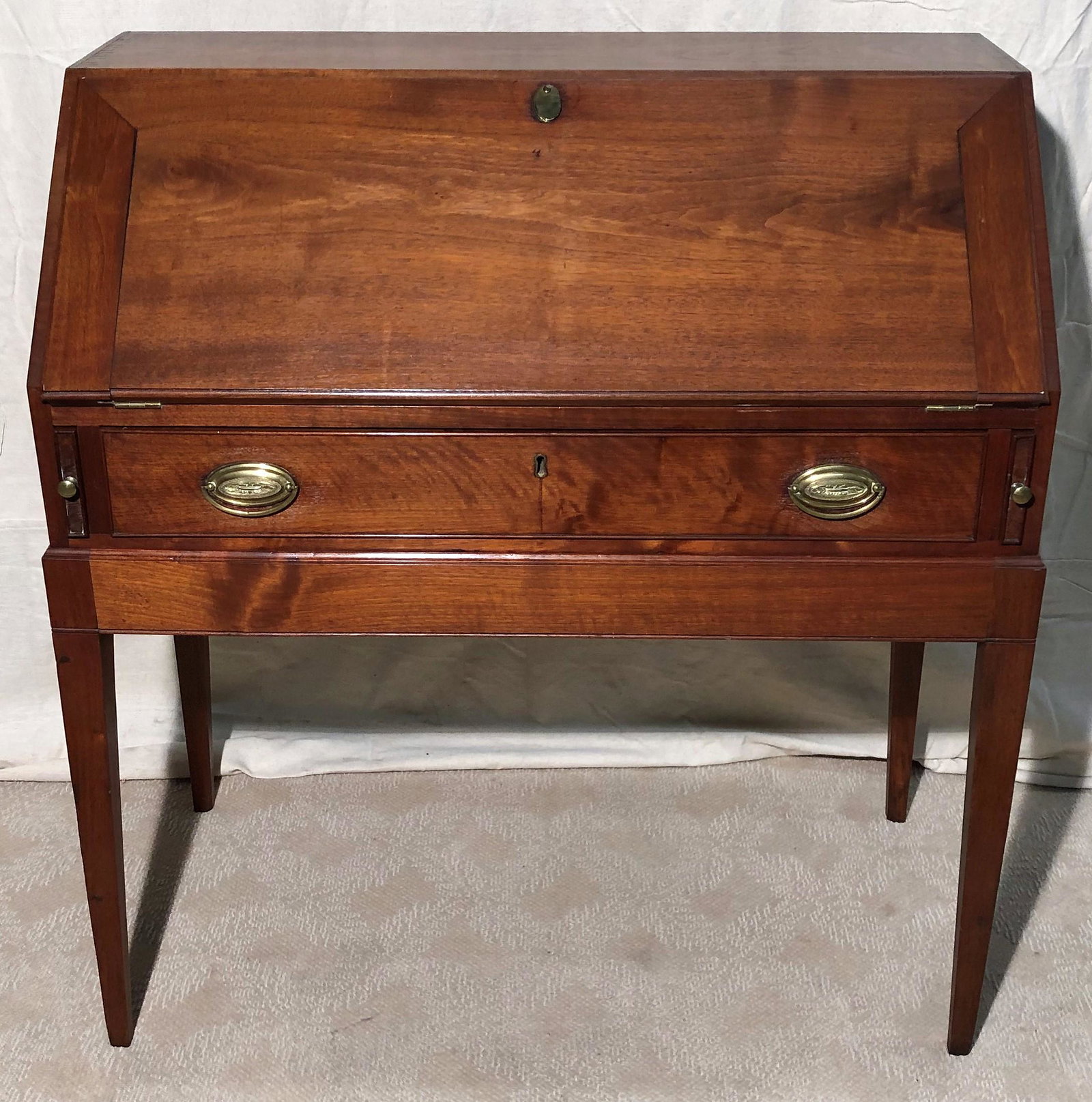 ANTIQUE DESK ON FRAME: Walnut, 3-drawer interior; (1) long drawer; H-44", W-40", G-VG