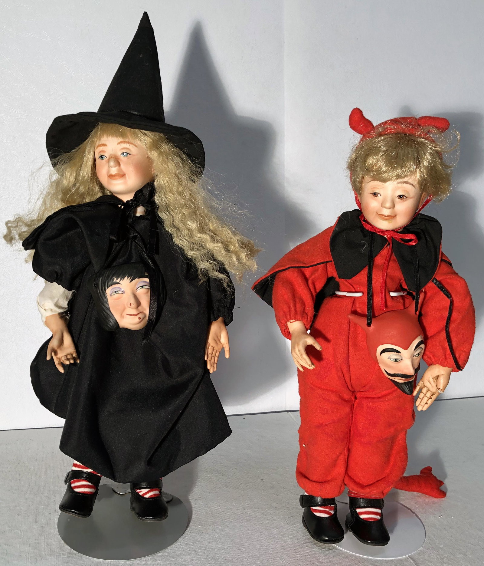 BISQUE HALLOWEEN DOLLS (2): Wind-up musical/animated; cloth bodies; (1) witch: not working; (1) devil: working, left thumb missing; H-13"-18", F-G