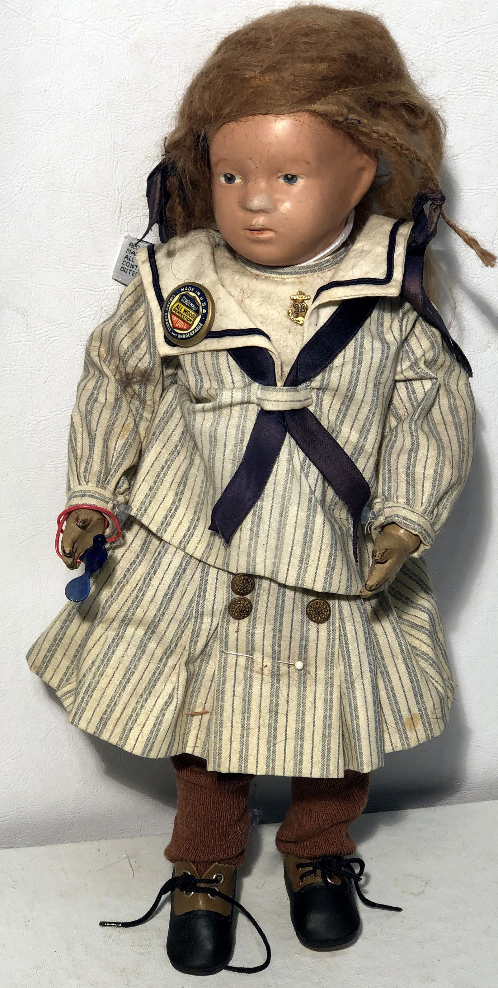 SCHOENHUT DOLL with BEAR: Wood with repainted face; paint wear to hands; jointed body; H-14 1/2", (1) Bear "Muff", Bear Essentials, Effanbee Doll Co., B049; F-G