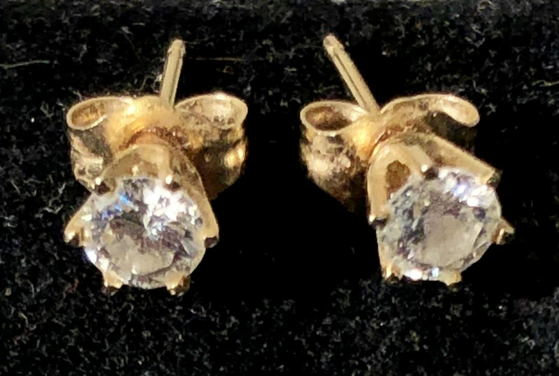 PAIR OF DIAMOND STUDS: 14K yellow gold setting; (2) 1/4 carat round brilliant diamonds; L-1/2", .5 dwt total