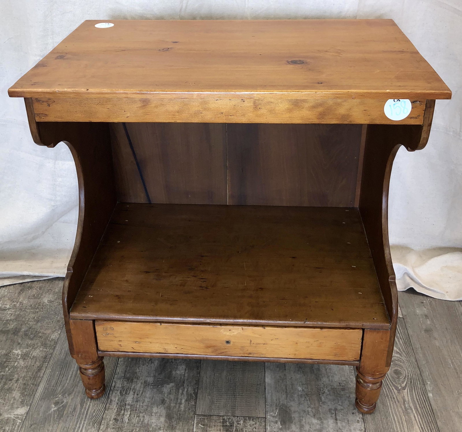 OPEN WASHSTAND: Pine and mixed wood; lower drawer; turned feet; H-27", W-25", G-VG