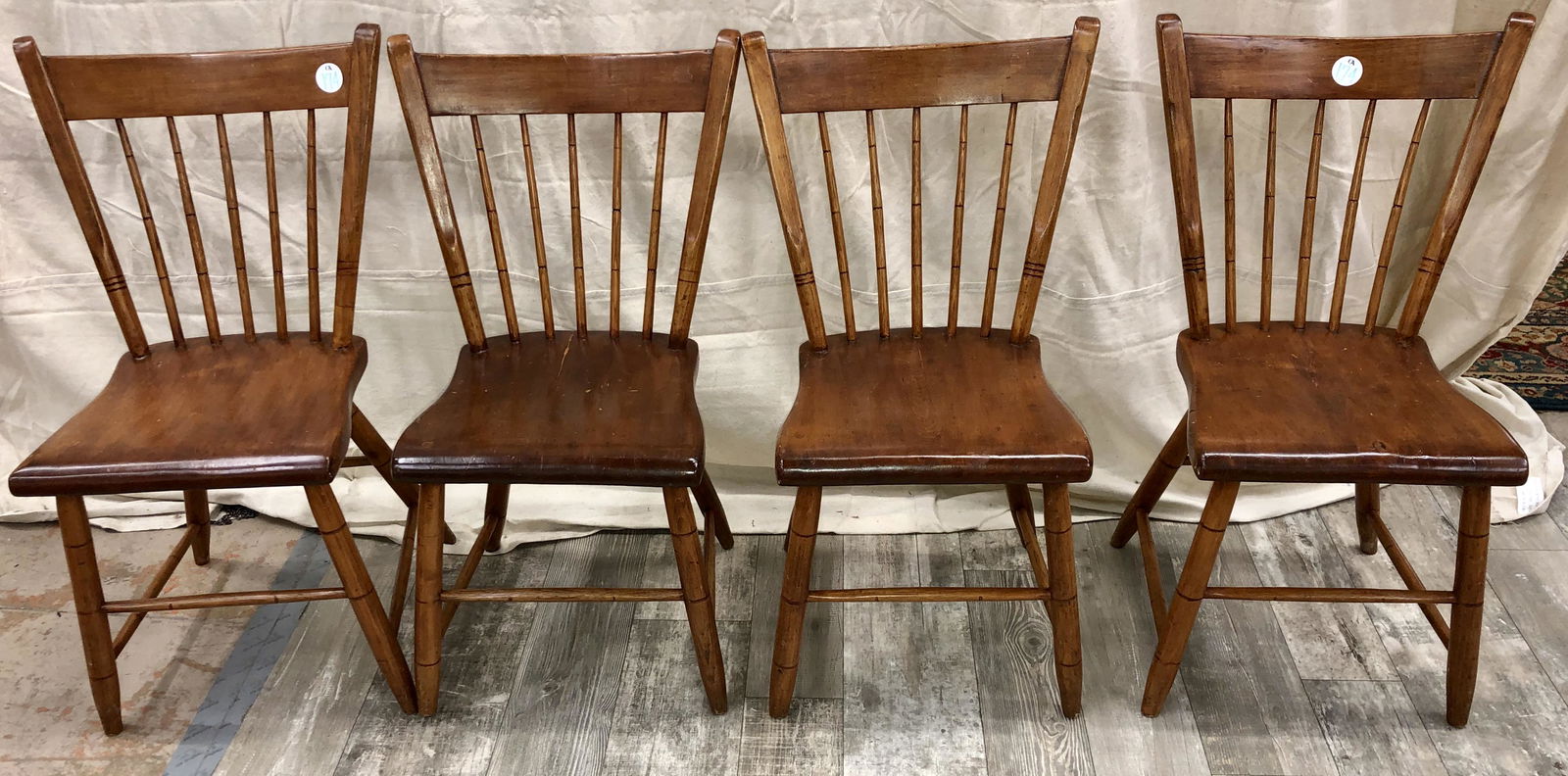 SET OF WINDSOR CHAIRS (4): Mixed wood; plank seats; H-33", W-18 1/2"
