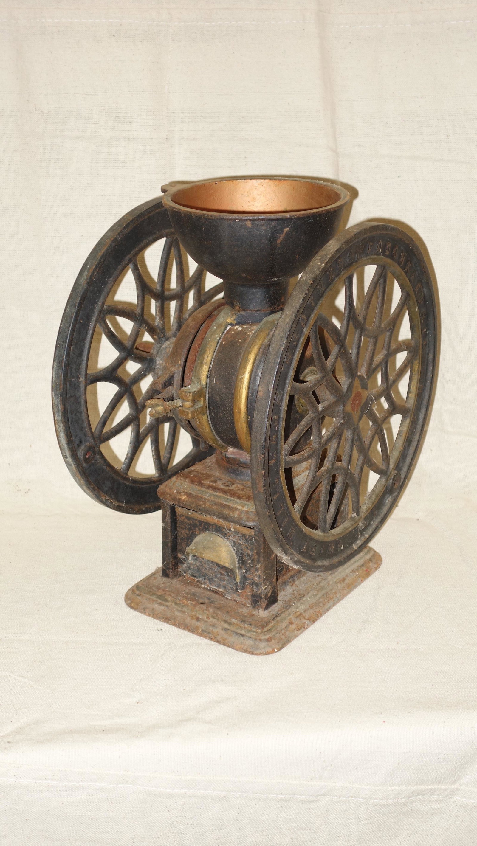 ANTIQUE COFFEE MILL: Swift Mill, Lane Bros. Poughkeepsie NY; iron with tin drawer (rust holes); base rusted; two wood handles in drawer; may or may not be original; mostly complete; H-15", G