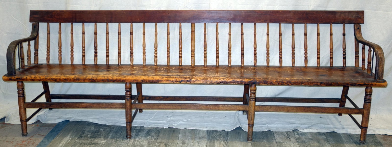 DEACONS BENCH: Pine and mixed wood; eight leg, spindle back; wear; L-92", H-31", G
