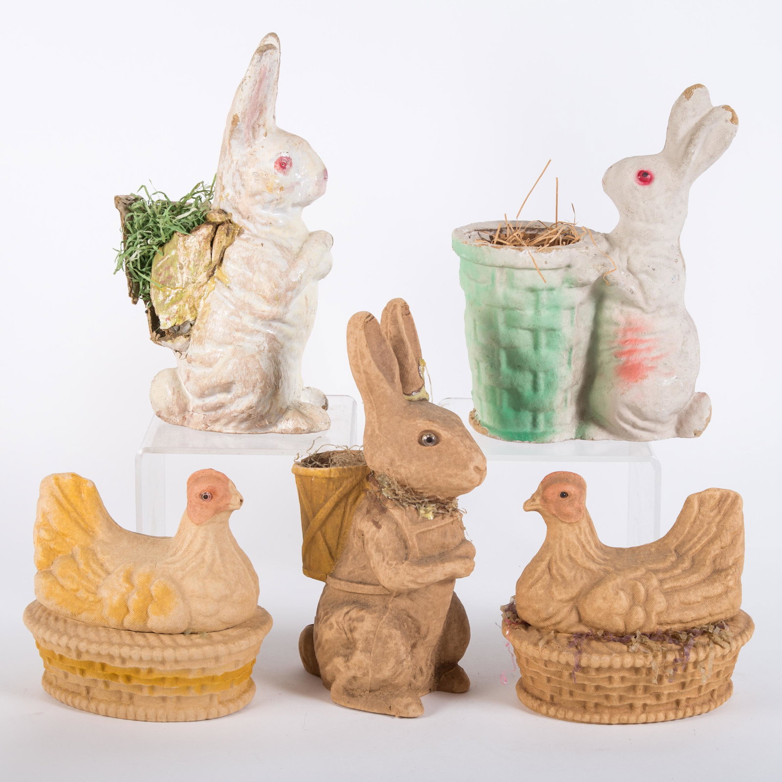 PAPIER MACHE EASTER CANDY CONTAINERS (5): Painted egg carton material; (3) rabbits: brown rabbit has head and ear repair; large white rabbit's basket has had some repair with pieces missing; white rabbit with green basket has some denting and