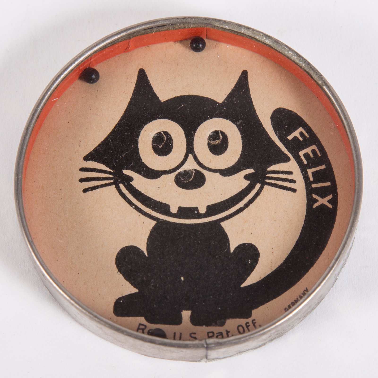 VINTAGE FELIX DEXTERITY GAME: Germany; glass, paper litho and metal; back side is a mirror; mirror spotty; metal edge has some corrosion; paper toned; Dia.-3", G-VG