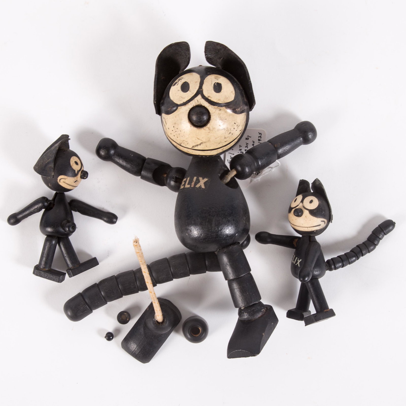 VINTAGE FELIX CAT TOYS (3): Sullivan, jointed painted wood; all marked "Sullivan" on foot; (1) small Felix, missing a portion of his tail; (1) large Felix is missing a portion of one leg; some parts remain; overall scuffs and ma